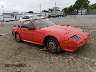 1984 Nissan 300ZX z VIN JN1CZ14SXEX009648, wystawiony jako Copart lot #56090024 z przebiegiem 48 776 mil mil oraz Szkody całkowita. Historia ofert i sprzedaży dostępna na DreamBid. Obrazek 4.