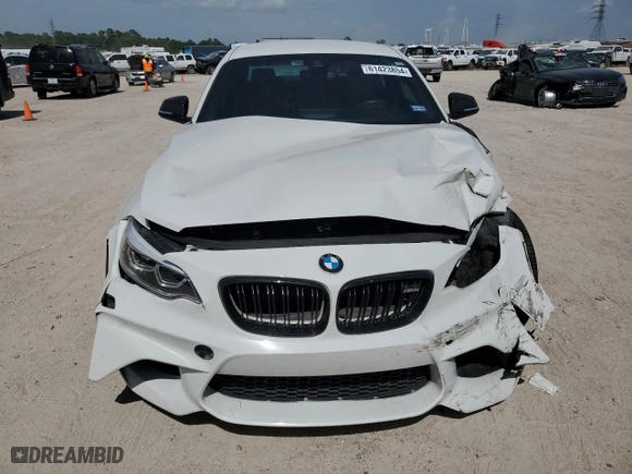 2018 BMW M2 with VIN WBS1J5C51JVD36522, listed as a Copart auction lot 61423854 with 57,933 mi miles and Salvage Title. Bid and sale history available at carsss.com. Image 5.
