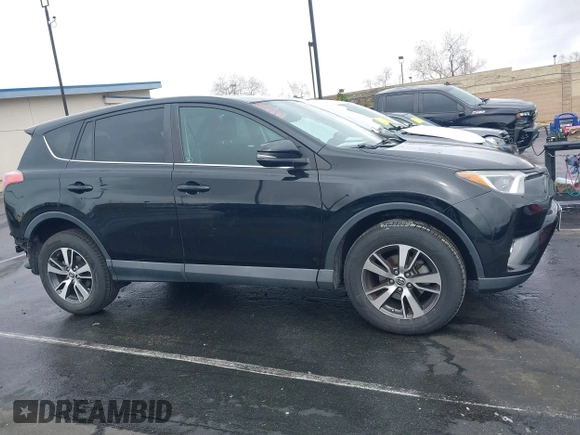 2018 Toyota RAV4 XLE with VIN 2T3WFREV3JW516867, listed as a IAAI auction lot 41765369 with 54,390 mi miles. Bid and sale history available at carsss.com. Image 14.