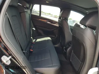 2022 BMW X4 M z VIN 5YM23EC06N9J91068, wystawiony jako Copart lot #60110194 z przebiegiem 25 358 mil mil oraz Szkoda całkowita • Salvage title. Historia ofert i sprzedaży dostępna na DreamBid. Obrazek 11.