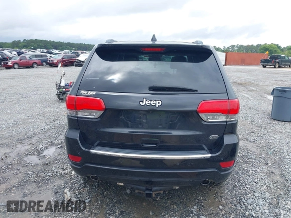 2015 Jeep Grand Cherokee Overland with VIN 1C4RJECG3FC152601, listed as a IAAI auction lot 42414340 with 139,315 mi miles and . Bid and sale history available at DreamBid. Image 16.