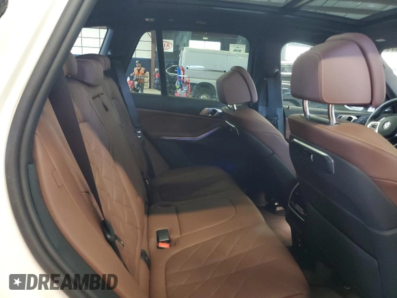 2025 BMW X5 xDrive40i z VIN 5UX23EU01S9X75945, wystawiony jako Copart lot #53264685 z przebiegiem 3 254 mil mil oraz Szkoda całkowita • Salvage title. Historia ofert i sprzedaży dostępna na DreamBid. Obrazek 11.