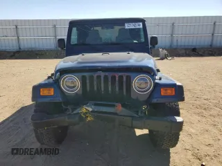 2004 Jeep Wrangler Sport with VIN 1J4FA49S34P724081, listed as a Copart auction lot 72174274 with 150,810 mi miles and Salvage Title. Bid and sale history available at carsss.com. Image 5.