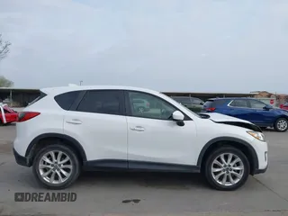 2013 Mazda CX-5 Grand Touring with VIN JM3KE2DEXD0166115, listed as a IAAI auction lot 41919164 with 102,999 mi miles and . Bid and sale history available at carsss.com. Image 14.