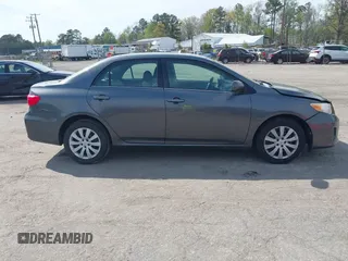 2013 Toyota Corolla L with VIN 2T1BU4EE7DC100830, listed as a IAAI auction lot 42032150 with 205,914 mi miles. Bid and sale history available at carsss.com. Image 13.