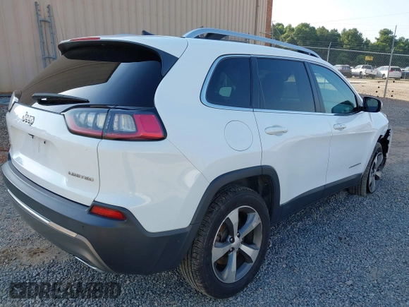 2020 Jeep Cherokee Limited with VIN 1C4PJMDXXLD612052, listed as a IAAI auction lot 42582343 with 96,072 mi miles and . Bid and sale history available at DreamBid. Image 4.