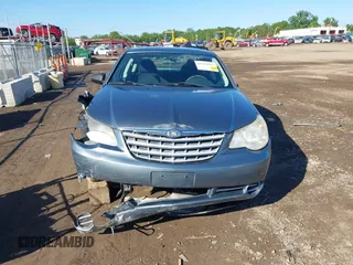 2010 Chrysler Sebring Touring z VIN 1C3CC4FB0AN128655, wystawiony jako IAAI lot #42311837 z przebiegiem 205 720 mil mil oraz . Historia ofert i sprzedaży dostępna na DreamBid. Obrazek 13.
