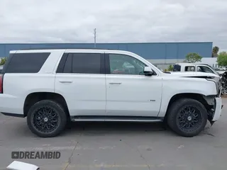 2019 GMC Yukon SLT with VIN 1GKS2BKC3KR160060, listed as a IAAI auction lot 42042122 with 124,733 mi miles. Bid and sale history available at carsss.com. Image 14.