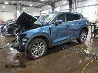 2019 Mazda CX-5 Grand Touring with VIN JM3KFBDM8K0693037, listed as a Copart auction lot 59534695 with Not provided miles and Salvage title. Bid and sale history available at DreamBid. Image 1.
