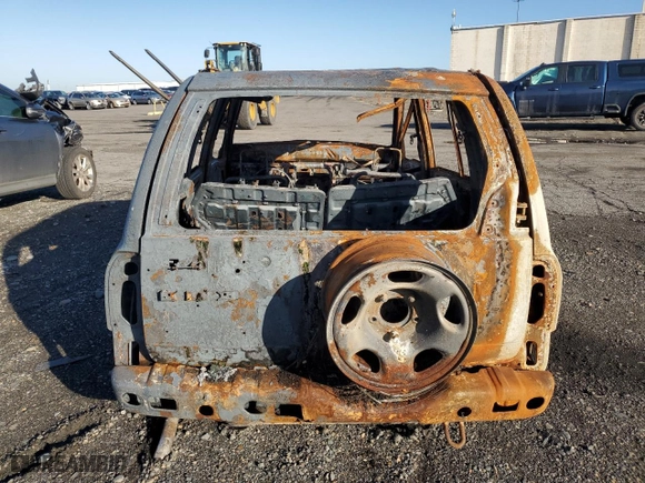 2000 Suzuki Grand Vitara JLX with VIN JS3TD62V0Y4130959, listed as a Copart auction lot 86070084 with 0 mi miles and Salvage Title. Bid and sale history available at carsss.com. Image 6.