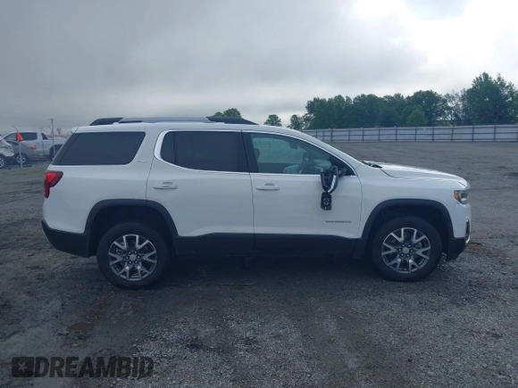 2023 GMC Acadia SLT with VIN 1GKKNML4XPZ156685, listed as a IAAI auction lot 42231988 with 61,094 mi miles and . Bid and sale history available at DreamBid. Image 13.