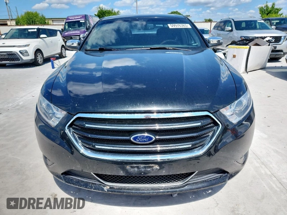 2015 Ford Taurus Limited with VIN 1FAHP2F89FG108744, listed as a Copart auction lot 59976365 with 67,181 mi miles and Salvage title. Bid and sale history available at DreamBid. Image 5.