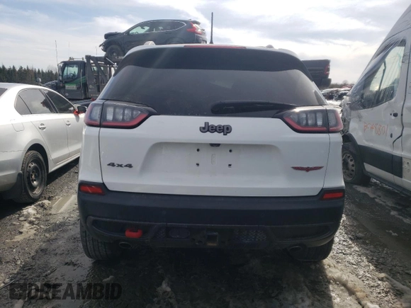 2021 Jeep Cherokee Trailhawk with VIN 1C4PJMBX4MD138927, listed as a Copart auction lot 51919555 with 92,759 mi miles and Salvage title. Bid and sale history available at DreamBid. Image 6.