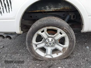 2011 Ford F-150 Lariat with VIN 1FTFW1E63BFB80098, listed as a IAAI auction lot 42038087 with 243,992 mi miles. Bid and sale history available at carsss.com. Image 21.