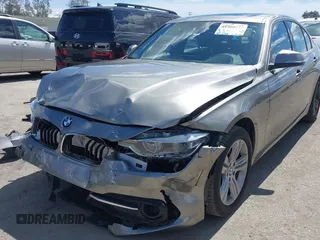 2018 BMW 3 Series 330i with VIN WBA8B9G58JNU98341, listed as a IAAI auction lot 41909777 with 85,396 mi miles and . Bid and sale history available at DreamBid. Image 6.