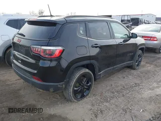 2020 Jeep Compass Latitude with VIN 3C4NJDBB9LT137387, listed as a IAAI auction lot 41379552 with 79,083 mi miles and . Bid and sale history available at carsss.com. Image 4.