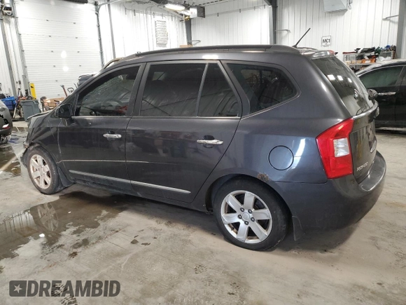 2008 Kia Rondo LX Base with VIN KNAFG525287212765, listed as a Copart auction lot 87700005 with 286,337 mi miles and Salvage Title. Bid and sale history available at carsss.com. Image 2.
