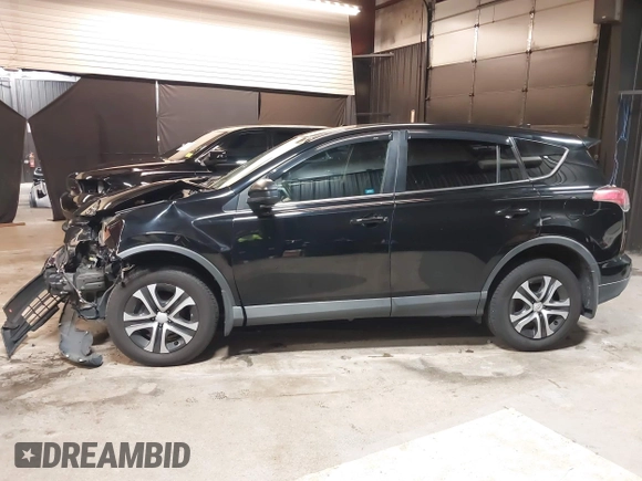 2018 Toyota RAV4 LE with VIN 2T3BFREV7JW768376, listed as a IAAI auction lot 41864571 with 292,147 mi miles. Bid and sale history available at carsss.com. Image 15.