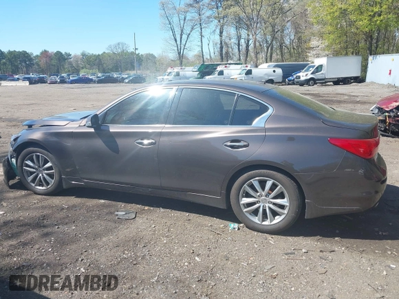 2014 Infiniti Q50 Premium with VIN JN1BV7ARXEM684719, listed as a IAAI auction lot 42122949 with 126,656 mi miles and . Bid and sale history available at DreamBid. Image 14.
