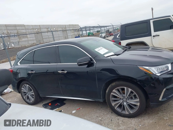 2018 Acura MDX Technology z VIN 5J8YD3H52JL009230, wystawiony jako IAAI lot #42413472 z przebiegiem 61 306 mil mil oraz . Historia ofert i sprzedaży dostępna na DreamBid. Obrazek 13.