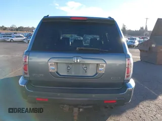 2007 Honda Pilot EX-L with VIN 2HKYF18697H540993, listed as a IAAI auction lot 41243560 with 320,290 mi miles and . Bid and sale history available at DreamBid. Image 16.