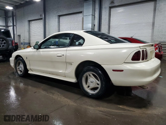 1996 Ford Mustang with VIN 1FALP4045TF168100, listed as a Copart auction lot 60464845 with 116,702 mi miles and Salvage title. Bid and sale history available at DreamBid. Image 2.