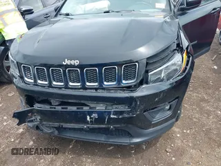 2017 Jeep Compass Latitude with VIN 3C4NJCBB3HT653021, listed as a IAAI auction lot 42263281 with 91,076 mi miles and . Bid and sale history available at DreamBid. Image 6.
