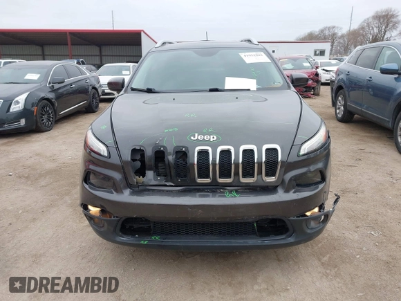 2016 Jeep Cherokee 75th Anniversary with VIN 1C4PJLCB1GW190344, listed as a IAAI auction lot 41951042 with 90,814 mi miles. Bid and sale history available at carsss.com. Image 6.