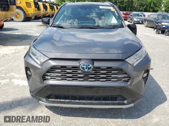 2021 Toyota RAV4 Hybrid XSE with VIN 2T3E6RFV8MW005489, listed as a Copart auction lot 56984825 with 92,632 mi miles and Salvage title. Bid and sale history available at DreamBid. Image 5.