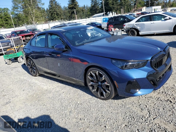 2025 BMW 5 Series with VIN WBA13FK06SCT74610, listed as a Copart auction lot 55362185 with Not provided miles and Salvage title. Bid and sale history available at DreamBid. Image 4.