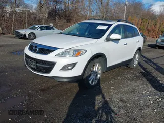2011 Mazda CX-9 Grand Touring z VIN JM3TB3DV7B0313202, wystawiony jako IAAI lot #41213863 z przebiegiem 204 507 mil mil oraz . Historia ofert i sprzedaży dostępna na DreamBid. Obrazek 2.