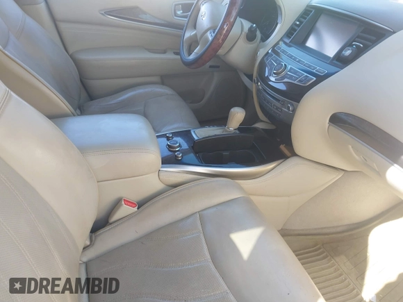 2014 Infiniti QX60 with VIN 5N1AL0MM0EC555055, listed as a IAAI auction lot 41880143 with 128,536 mi miles and . Bid and sale history available at carsss.com. Image 5.