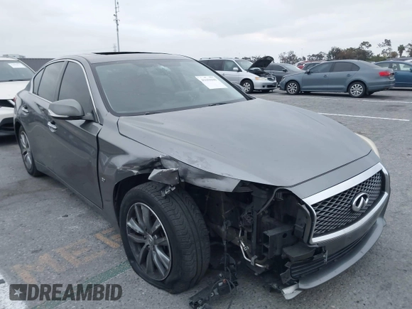 2015 Infiniti Q50 Premium with VIN JN1BV7AP6FM357265, listed as a IAAI auction lot 42104440 with 83,404 mi miles. Bid and sale history available at carsss.com. Image 1.