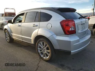 2011 Dodge Caliber Heat with VIN 1B3CB5HA7BD141422, listed as a Copart auction lot 42651095 with 148,995 mi miles and Salvage Title. Bid and sale history available at DreamBid. Image 2.
