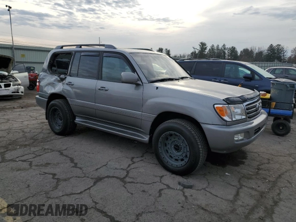 2004 Toyota Land Cruiser with VIN JTEHT05J242065384, listed as a Copart auction lot 83311194 with 132,495 mi miles and Salvage Title. Bid and sale history available at carsss.com. Image 4.