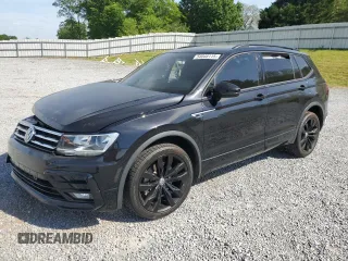 2021 Volkswagen Tiguan SE z VIN 3VV2B7AX8MM051810, wystawiony jako Copart lot #54045115 z przebiegiem 69 811 mil mil oraz Szkoda całkowita • Salvage title. Historia ofert i sprzedaży dostępna na DreamBid. Obrazek 1.