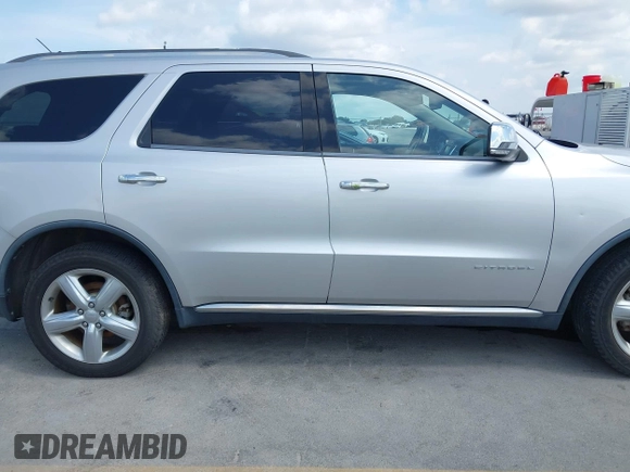 2013 Dodge Durango Citadel with VIN 1C4RDHEG0DC571833, listed as a IAAI auction lot 42736033 with 110,808 mi miles and . Bid and sale history available at DreamBid. Image 13.