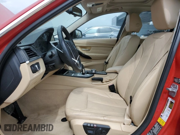 2014 BMW 3 Series 328i xDrive with VIN WBA3B3C59EJ977670, listed as a Copart auction lot 61997165 with 128,937 mi miles and Salvage title. Bid and sale history available at DreamBid. Image 7.