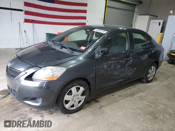 2009 Toyota Yaris z VIN JTDBT903991335683, wystawiony jako Copart lot #52565155 z przebiegiem 143 737 mil mil oraz Szkody całkowita. Historia ofert i sprzedaży dostępna na DreamBid. Obrazek 1.