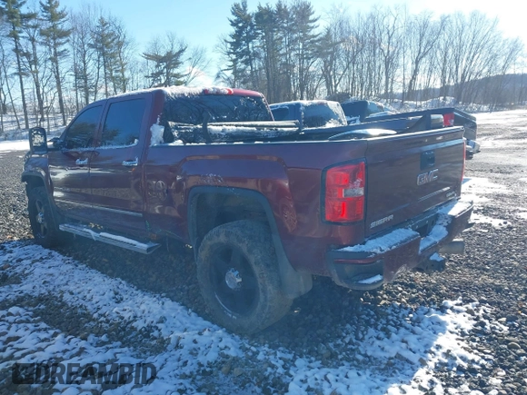 2015 GMC Sierra 2500HD Denali z VIN 1GT120E8XFF188285, wystawiony jako IAAI lot #41586993 z przebiegiem 141 691 mil mil oraz . Historia ofert i sprzedaży dostępna na DreamBid. Obrazek 3.