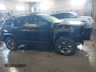 2019 Jeep Cherokee Trailhawk Elite with VIN 1C4PJMBX5KD278921, listed as a IAAI auction lot 41843126 with 139,431 mi miles. Bid and sale history available at carsss.com. Image 14.