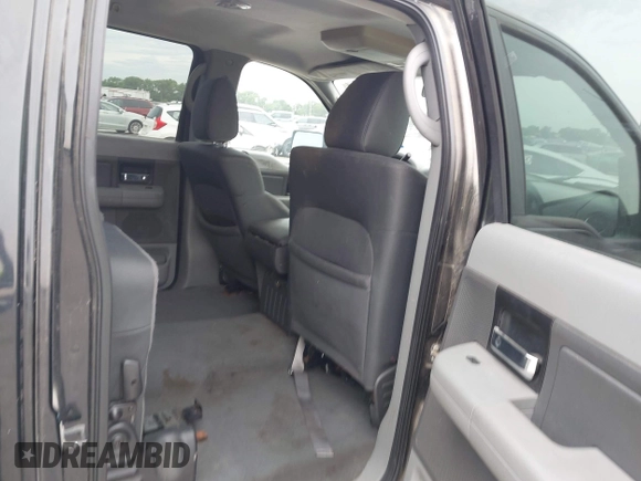2007 Ford F-150 XLT with VIN 1FTRW12W67KC73472, listed as a IAAI auction lot 42450421 with 191,653 mi miles and . Bid and sale history available at DreamBid. Image 8.