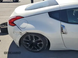 2014 Nissan 370Z Nismo with VIN JN1AZ4EH2EM633022, listed as a Copart auction lot 46947575 with 115,042 mi miles and Salvage Title. Bid and sale history available at DreamBid. Image 10.
