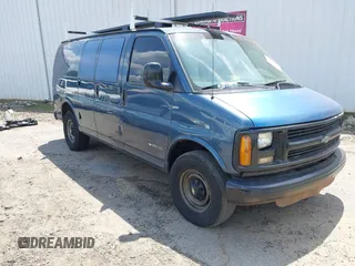 1998 Chevrolet Chevy Van z VIN 1GCGG25RXW1100879, wystawiony jako IAAI lot #42154197 z przebiegiem 191 241 mil mil oraz . Historia ofert i sprzedaży dostępna na DreamBid. Obrazek 1.