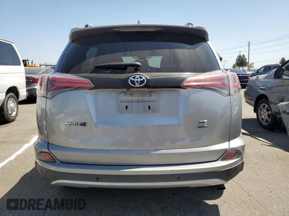 2016 Toyota RAV4 SE z VIN 2T3JFREV5GW499752, wystawiony jako Copart lot #62032045 z przebiegiem 77 711 mil mil oraz Szkoda całkowita • Salvage title. Historia ofert i sprzedaży dostępna na DreamBid. Obrazek 6.