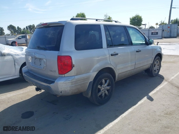2003 Honda Pilot EX with VIN 2HKYF18443H571688, listed as a IAAI auction lot 42097297 with 313,910 mi miles. Bid and sale history available at carsss.com. Image 4.