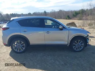 2021 Mazda CX-5 Grand Touring Reserve with VIN JM3KFBAY5M0472988, listed as a IAAI auction lot 41897855 with 27,318 mi miles. Bid and sale history available at carsss.com. Image 14.