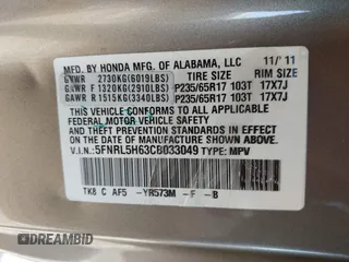 2012 Honda Odyssey EX-L z VIN 5FNRL5H63CB033049, wystawiony jako IAAI lot #42260501 z przebiegiem 165 693 mil mil oraz . Historia ofert i sprzedaży dostępna na DreamBid. Obrazek 9.