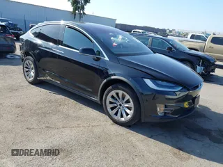 2017 Tesla Model X 90D with VIN 5YJXCBE25HF044617, listed as a IAAI auction lot 42096323 with 115,077 mi miles and . Bid and sale history available at DreamBid. Image 1.