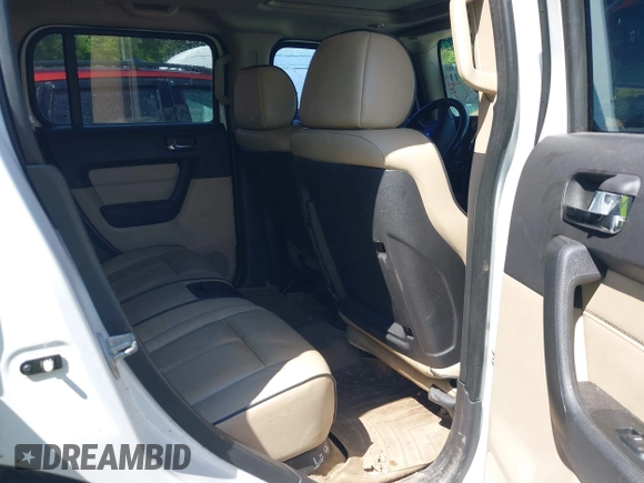 2007 Hummer H3 SUV with VIN 5GTDN13E978105558, listed as a IAAI auction lot 42175911 with 126,439 mi miles and . Bid and sale history available at DreamBid. Image 8.